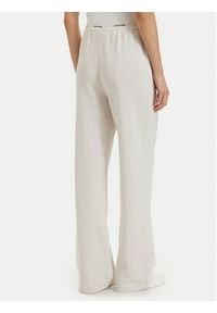 Calvin Klein Jeans Spodnie dresowe LV047G253G Kremowy Relaxed Fit. Kolor: kremowy. Materiał: bawełna #4