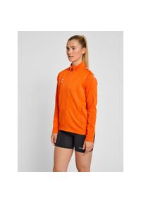 Bluza sportowa damska Hummel half zip Core XK. Kolor: pomarańczowy, wielokolorowy, żółty. Materiał: dresówka. Sport: fitness