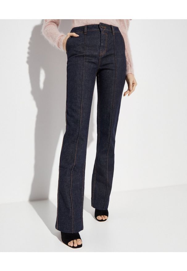 ZIMMERMANN - Granatowe jeansy z wysokim stanem. Stan: podwyższony. Kolor: niebieski