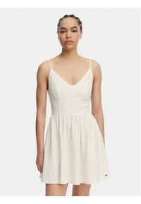 Tommy Jeans Sukienka letnia Skater DW0DW22345 Beżowy jasny Slim Fit. Kolor: beżowy. Materiał: len. Sezon: lato #1