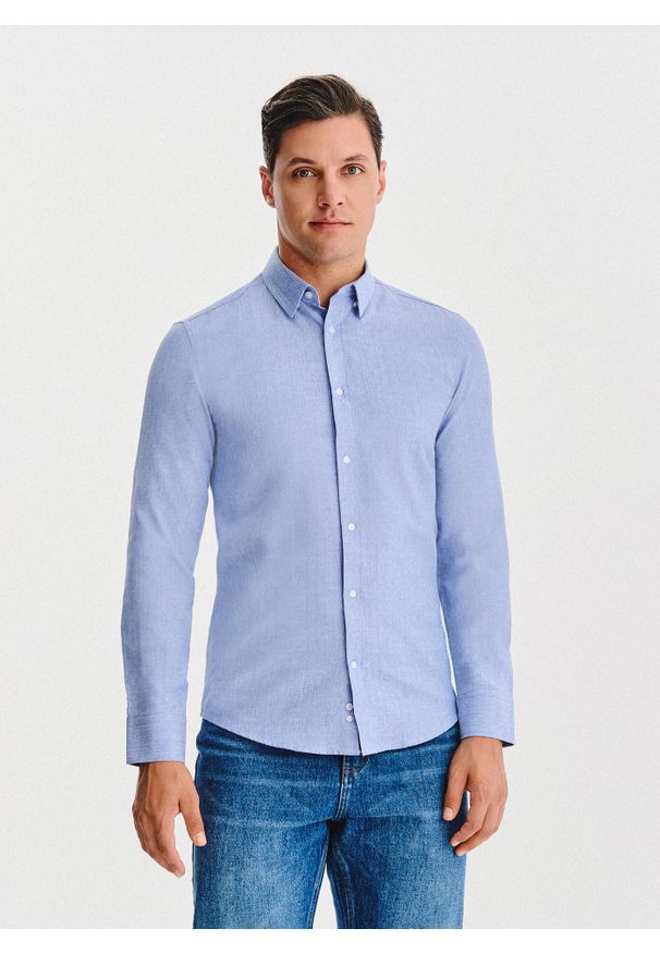 Pako Lorente - PAKO LORENTE - Niebieska koszula męska melanż. Kolor: niebieski. Materiał: bawełna, poliester. Długość rękawa: długi rękaw. Długość: długie. Wzór: melanż. Sezon: jesień
