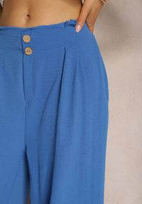 Renee - Niebieskie Spodnie w Stylu Alladynek High Waist Wykończone Gumką w Pasie Riselma. Okazja: na co dzień. Stan: podwyższony. Kolor: niebieski. Styl: sportowy, casual #5