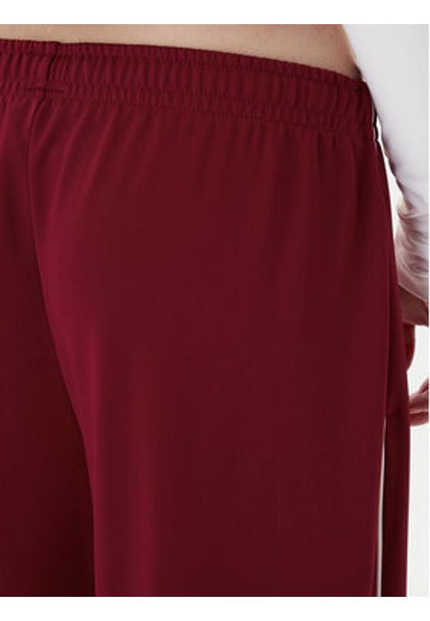 Tommy Jeans Spodnie dresowe Archive DW0DW22633 Bordowy Regular Fit. Kolor: czerwony. Materiał: syntetyk