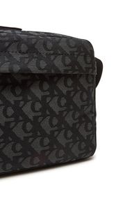 Calvin Klein Saszetka Slouched Monogram Mini Zip Fligh LV04G3175G Czarny. Kolor: czarny. Materiał: materiał #6