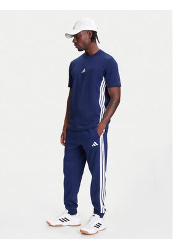 Adidas - adidas Spodnie dresowe Essentials 3-Stripes JD1859 Niebieski Regular Fit. Kolor: niebieski. Materiał: syntetyk