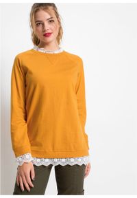 Bluza oversize z koronką bonprix miodowy. Kolor: pomarańczowy. Materiał: koronka. Wzór: koronka #7