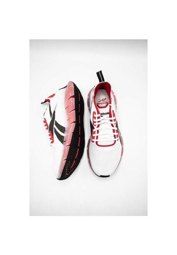 Buty do biegania męskie Reebok Zig Kinetica M. Zapięcie: sznurówki. Kolor: czerwony, wielokolorowy. Materiał: syntetyk, tkanina, materiał. Szerokość cholewki: normalna. Sport: bieganie