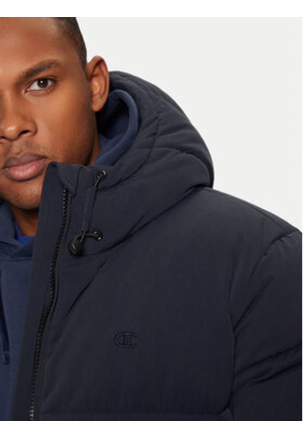 Champion Kurtka zimowa 220347 Granatowy Regular Fit. Kolor: niebieski. Materiał: syntetyk. Sezon: zima