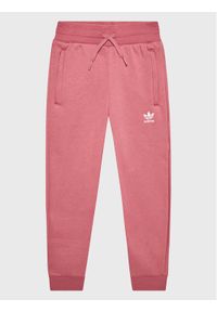 Adidas - adidas Spodnie dresowe IC6136 Różowy Regular Fit. Kolor: różowy. Materiał: bawełna