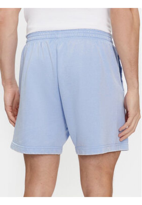 Tommy Jeans Szorty sportowe Tjm Arch Graphic Beach Short Ext DM0DM19167 Niebieski Regular Fit. Kolor: niebieski. Materiał: bawełna. Styl: sportowy