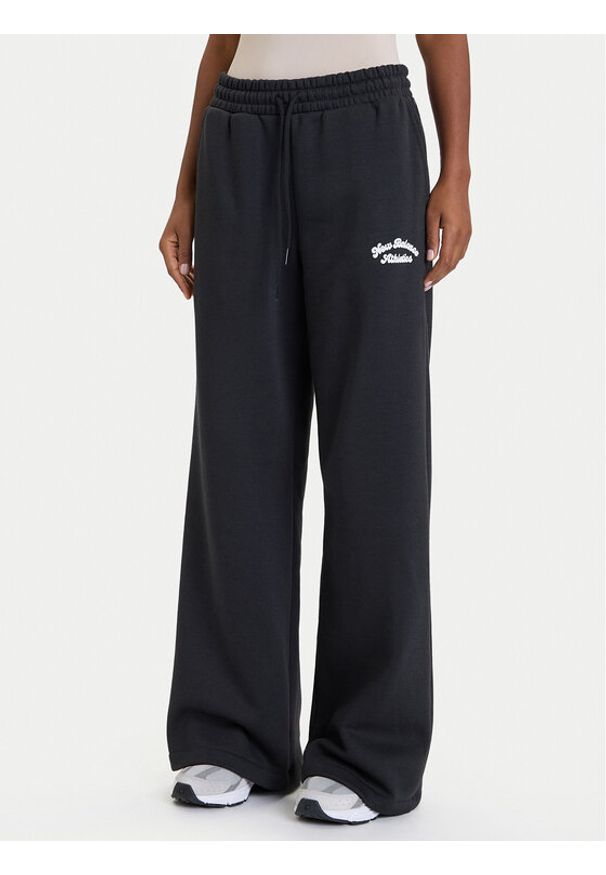 New Balance Spodnie dresowe WP53902 Czarny Relaxed Fit. Kolor: czarny. Materiał: bawełna