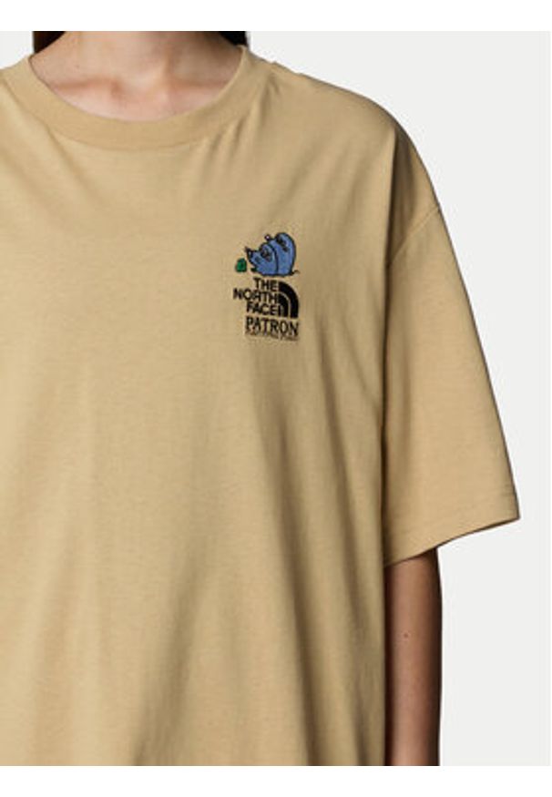 The North Face T-Shirt Unisex Mountain Cleanup NF0A8C4D Beżowy Oversize. Kolor: beżowy. Materiał: bawełna