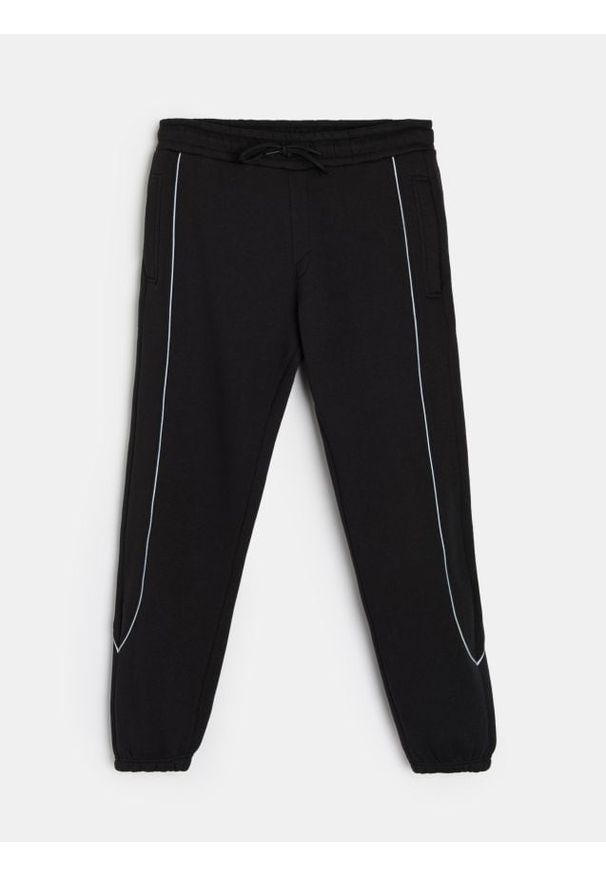 Sinsay - Spodnie dresowe - czarny. Kolor: czarny. Materiał: dresówka
