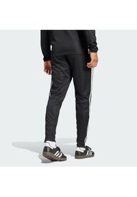 Adidas - adidas Spodnie dresowe Tiro 25 Essentials Training JD0442 Czarny Regular Fit. Kolor: czarny. Materiał: syntetyk #3