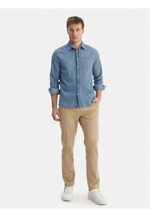 TOMMY HILFIGER - Tommy Hilfiger Koszula jeansowa MW0MW42431 Niebieski Regular Fit. Kolor: niebieski. Materiał: bawełna