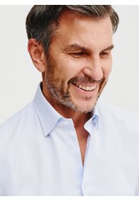 Pako Lorente - PAKO LORENTE – Gładka koszula męska w kolorze jasnoniebieskim. Kolor: szary, beżowy, niebieski, wielokolorowy. Materiał: bawełna. Długość rękawa: długi rękaw. Długość: długie. Wzór: gładki #9