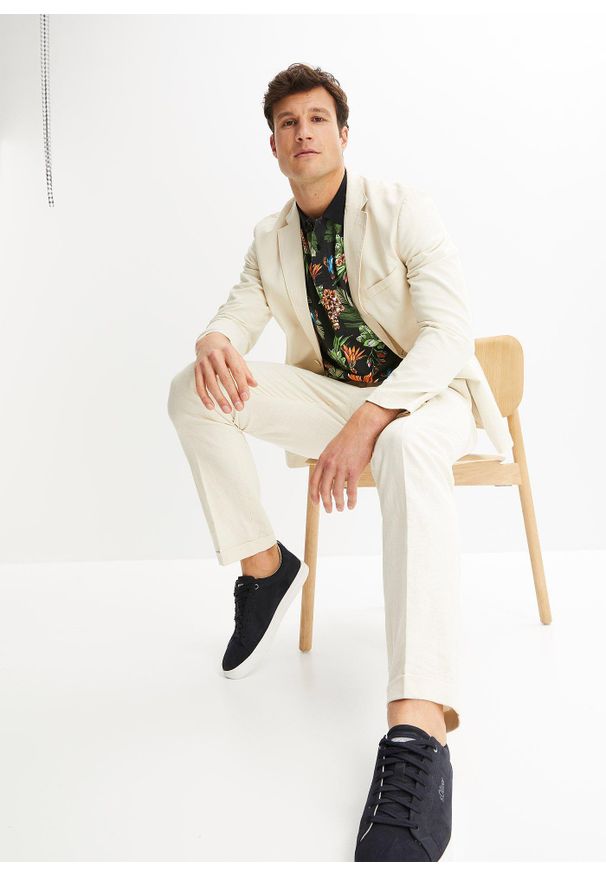 bonprix - Shirt polo. Typ kołnierza: polo. Kolor: czarny. Wzór: kwiaty. Sezon: lato