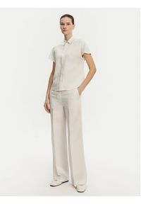 Calvin Klein Spodnie palazzo K20K208381 Beżowy Wide Leg. Kolor: beżowy. Materiał: lyocell