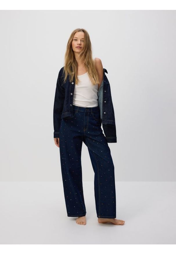 Reserved - Jeansy baggy z kryształkami - granatowy. Kolor: niebieski