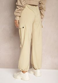 Renee - Beżowe Spodnie Cargo High Waist z Ozdobnymi Kieszeniami Leriora. Okazja: na co dzień. Stan: podwyższony. Kolor: beżowy. Styl: elegancki, casual #4