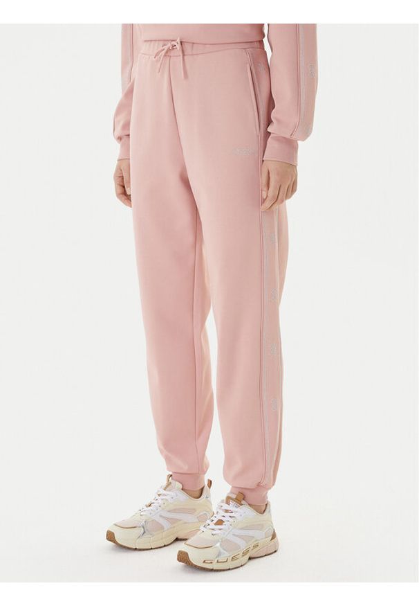 Guess Spodnie dresowe V5BB23 KCX22 Różowy Regular Fit. Kolor: różowy. Materiał: syntetyk