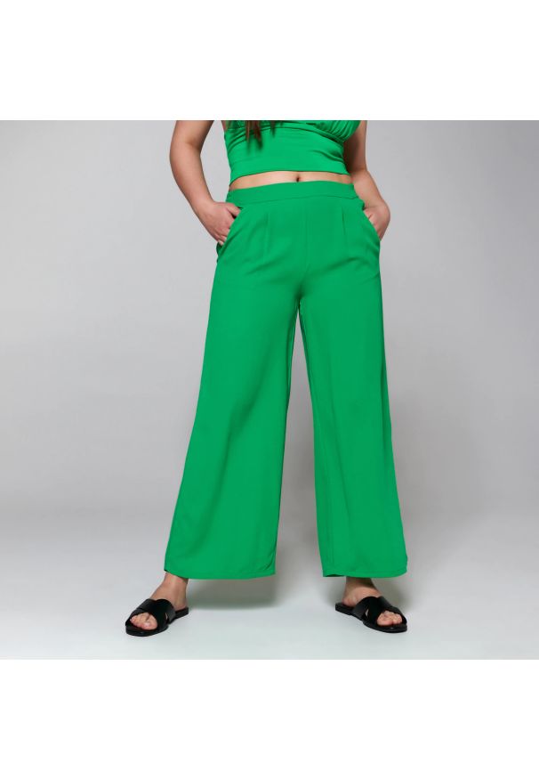 Sinsay - Spodnie tkaninowe - Zielony. Kolor: zielony. Materiał: tkanina
