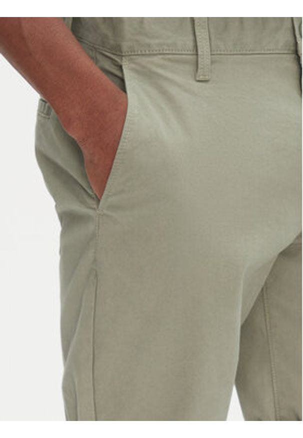 Tommy Jeans Szorty materiałowe Scanton DM0DM21950 Zielony Slim Fit. Kolor: zielony. Materiał: bawełna