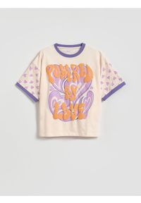 Reserved - Luźny t-shirt z nadrukiem - pastelowy róż. Kolor: różowy. Materiał: bawełna. Wzór: nadruk #1