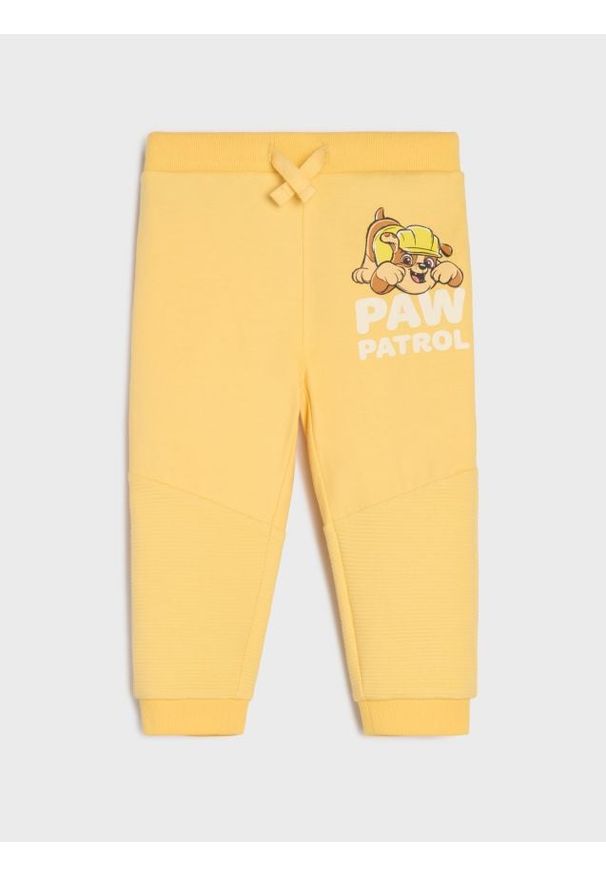 Sinsay - Spodnie dresowe PAW Patrol - żółty. Kolor: żółty. Materiał: dresówka