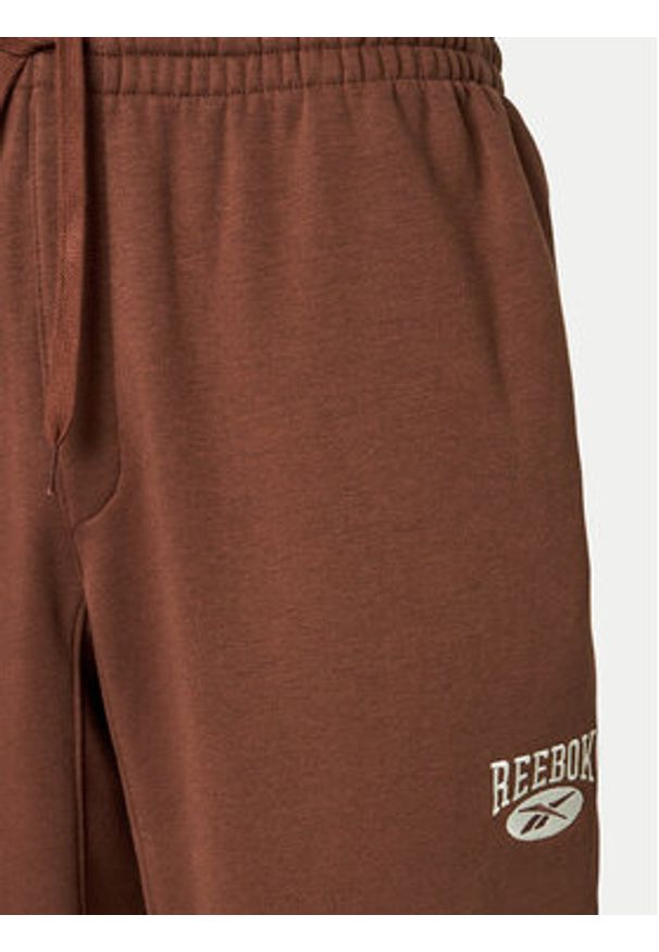 Reebok Spodnie dresowe Cl Ae Pant 100202799 Brązowy Regular Fit. Kolor: brązowy. Materiał: bawełna