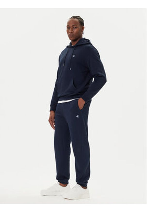 Calvin Klein Jeans Spodnie dresowe LV04RD241G Granatowy Regular Fit. Kolor: niebieski. Materiał: bawełna