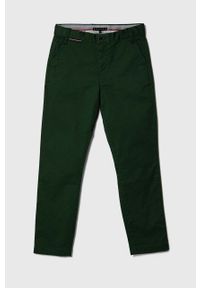 TOMMY HILFIGER - Tommy Hilfiger spodnie dziecięce kolor zielony gładkie. Okazja: na co dzień. Kolor: zielony. Materiał: bawełna. Wzór: gładki. Styl: casual #1