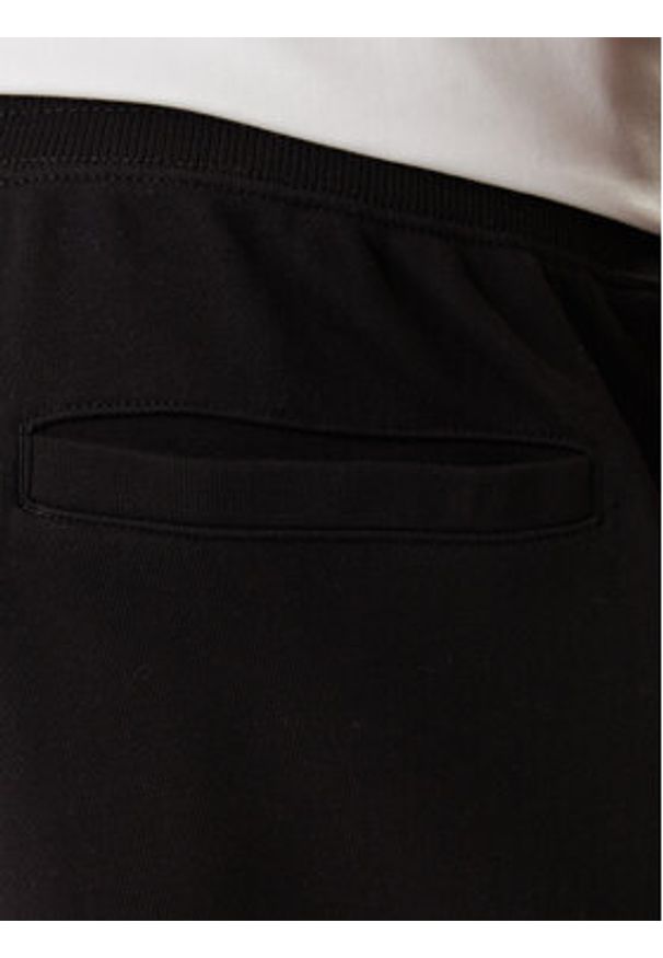 TOMMY HILFIGER - Tommy Hilfiger Spodnie dresowe Essential MW0MW37236 Czarny Regular Fit. Kolor: czarny. Materiał: bawełna