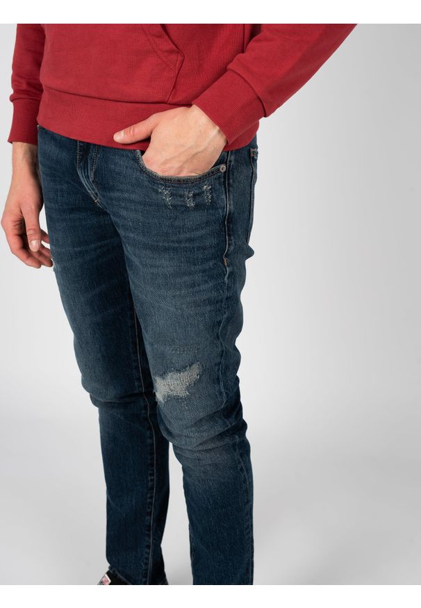 Diesel Jeansy "D-Strukt" | A12025-R9F05 | Mężczyzna | Niebieski. Okazja: na co dzień. Kolor: niebieski. Długość: długie. Styl: casual, elegancki, sportowy