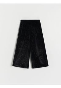 Reserved - Błyszczące spodnie kuloty - czarny. Kolor: czarny. Materiał: welur, dzianina #1