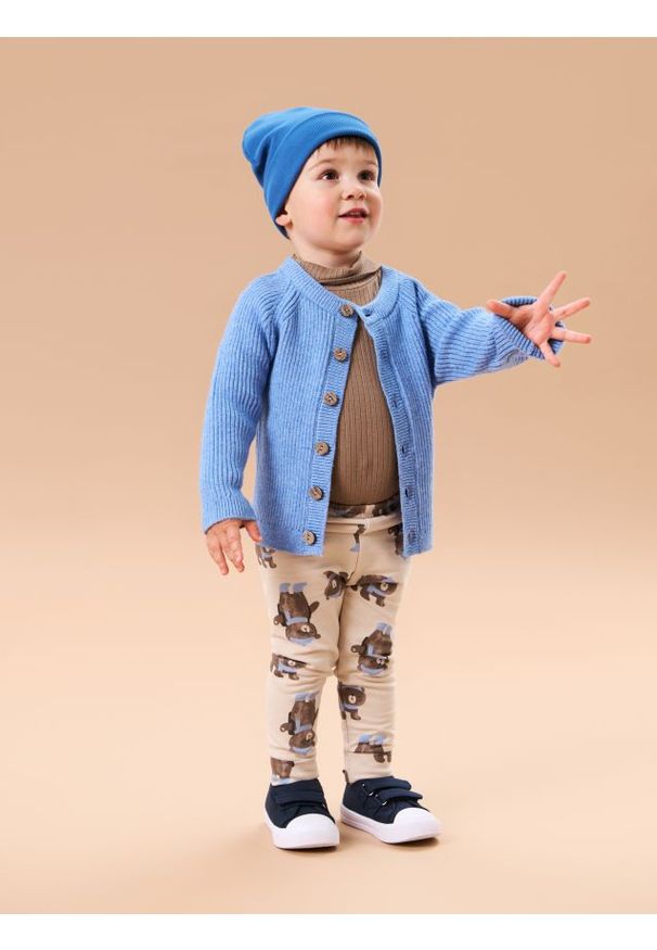 Sinsay - Grubsze legginsy ze wzorem misia - kremowy. Kolor: kremowy