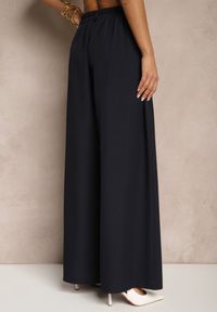 Renee - Granatowe Eleganckie Spodnie Palazzo z Szerokimi Nogawkami Adivisa. Stan: podwyższony. Kolor: niebieski. Styl: elegancki