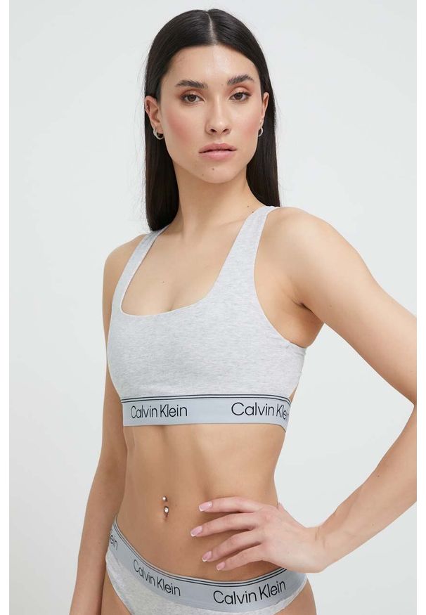 Calvin Klein Underwear biustonosz kolor szary wzorzysty. Kolor: szary. Materiał: dzianina. Rodzaj stanika: odpinane ramiączka