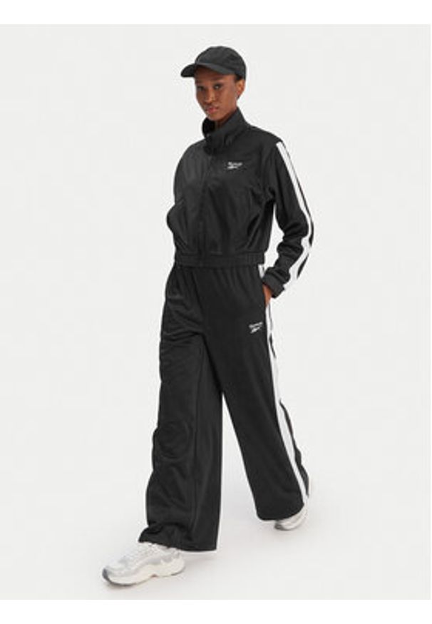 Reebok Spodnie dresowe Dianne RK25512CCW Czarny Relaxed Fit. Kolor: czarny. Materiał: syntetyk