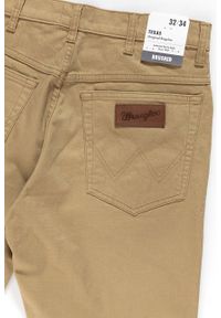 Wrangler - WRANGLER TEXAS MĘSKIE SPODNIE MATERIAŁOWE GOLDEN SAND W121TA223. Materiał: materiał #6