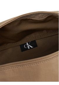 Calvin Klein Jeans Saszetka nerka Metro Oversized Waistbag Ny LV04G3088G Beżowy. Kolor: beżowy. Materiał: materiał #5