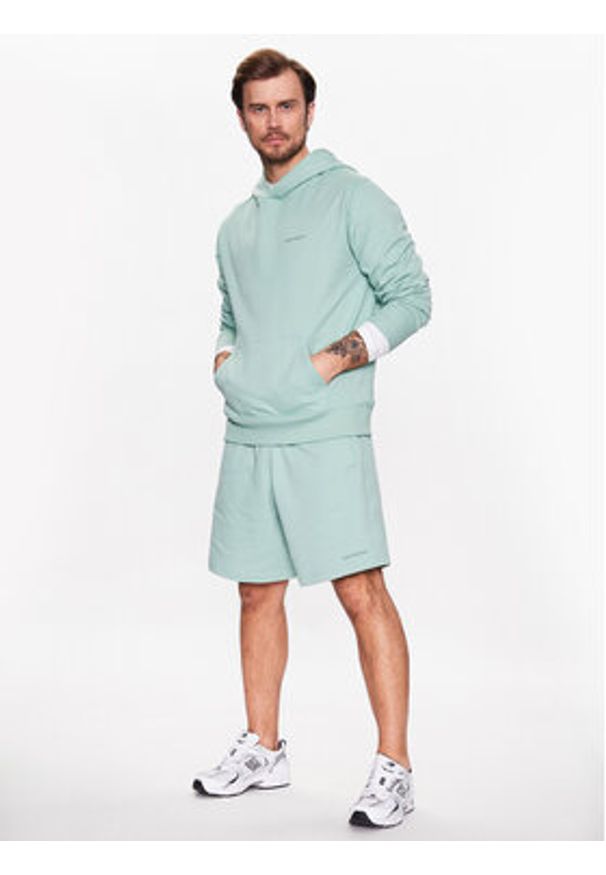 New Balance Szorty sportowe Athletics MS23550 Zielony Relaxed Fit. Kolor: zielony. Materiał: bawełna. Styl: sportowy