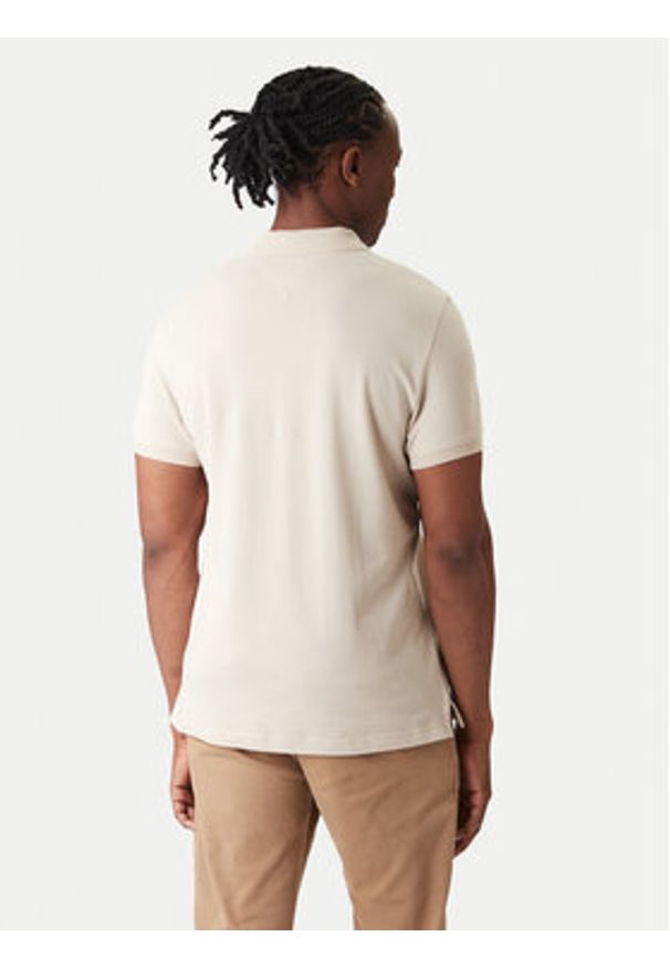 Tommy Jeans Polo DM0DM20676 Beżowy Slim Fit. Typ kołnierza: polo. Kolor: beżowy. Materiał: bawełna