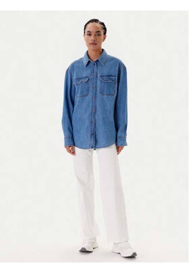 Tommy Jeans Koszula jeansowa DW0DW21073 Niebieski Relaxed Fit. Kolor: niebieski. Materiał: bawełna
