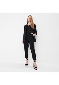Mohito - Spodnie joggery - Czarny. Kolor: czarny #1