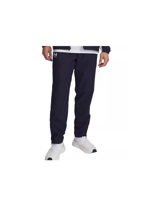 Spodnie dresowe Under Armour Rival. Kolor: biały, niebieski, wielokolorowy. Materiał: dresówka. Sport: fitness