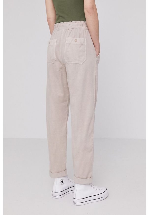 GAP - Spodnie. Okazja: na co dzień. Kolor: beżowy. Materiał: tkanina. Styl: casual