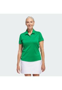 Adidas - Damska koszulka polo z krótkim rękawem Solid Performance. Typ kołnierza: polo. Kolor: zielony. Długość rękawa: krótki rękaw. Długość: krótkie. Styl: klasyczny, sportowy #1