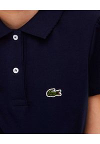 Lacoste - LACOSTE - Granatowa koszulka polo z wyhaftowanym logo. Typ kołnierza: polo. Kolor: niebieski. Materiał: bawełna, prążkowany. Wzór: haft. Styl: elegancki #3