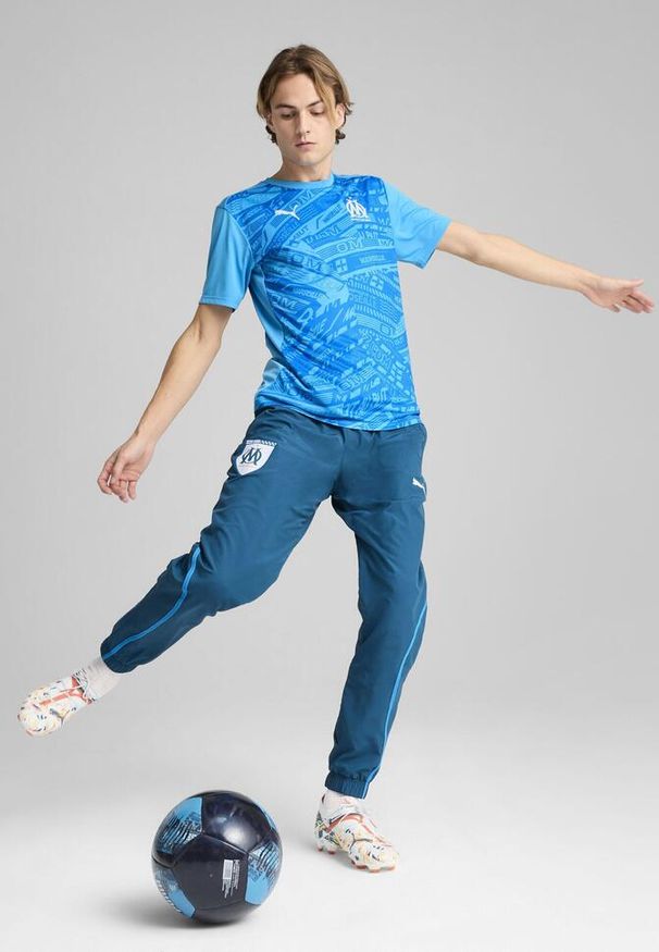 Puma - Męska koszulka przedmeczowa Olympique de Marseille PUMA. Kolor: niebieski. Materiał: materiał. Sport: piłka nożna